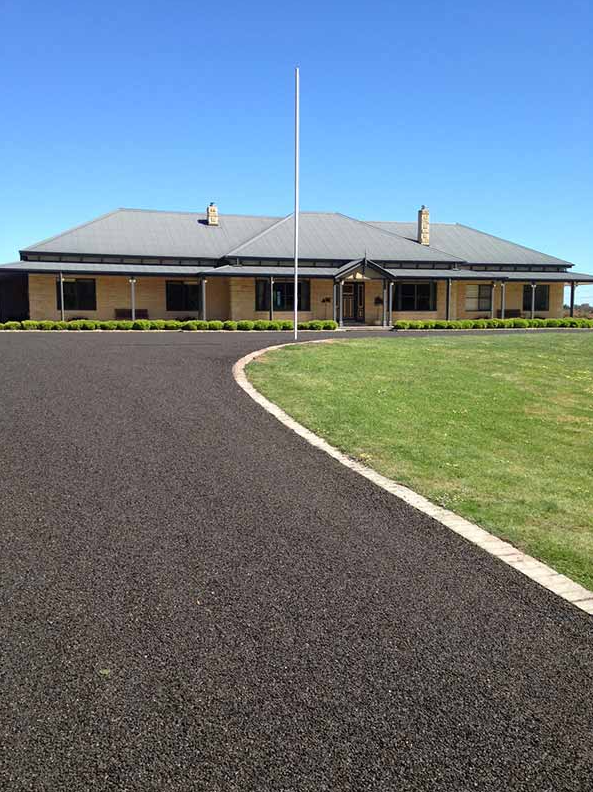 This is a photo of an asphalt driveway which has been installed by Yatala Surfacing Solutions
