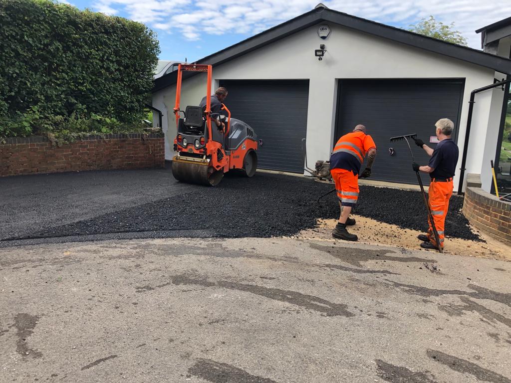 This is a photo of a bitumen driveway which is in the process of being installed by Yatala Surfacing Solutions